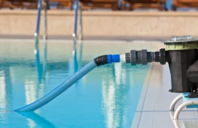 Pool water pump undergoing maintenance during professional service by Commercial Pool Kings.