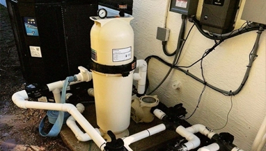 Commercial pool equipment operating during inspection and preventive care by Commercial Pool Kings.