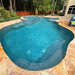 Large residential pool professionally maintained by Commercial Pool Kings for clean, clear water.